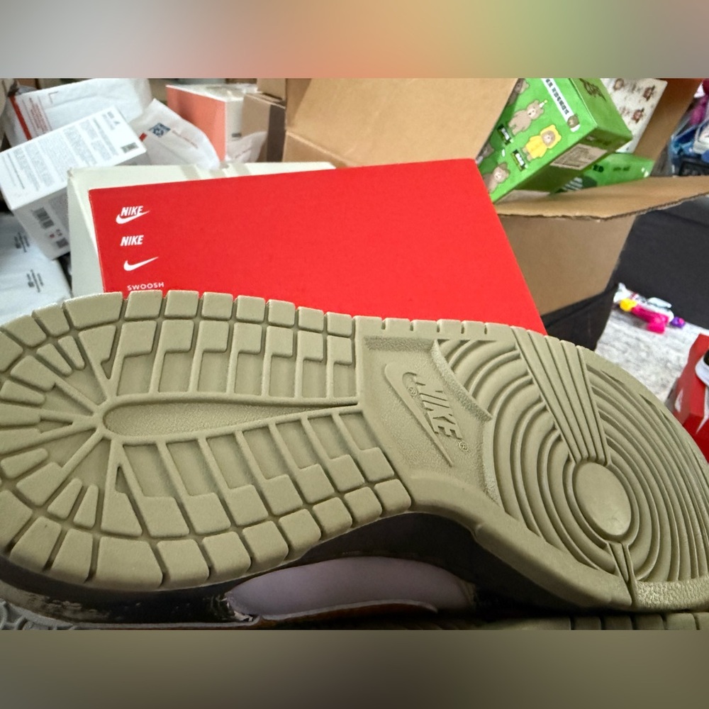 Nike Tan Sneakers with Concentric Tread Pattern